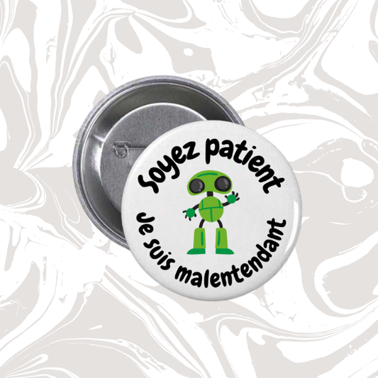 👉 Badge “Soyez patient – Je suis malentendant” (Robot vert)