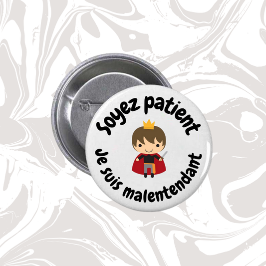 👉 Badge “Soyez patient – Je suis malentendant” (Prince)